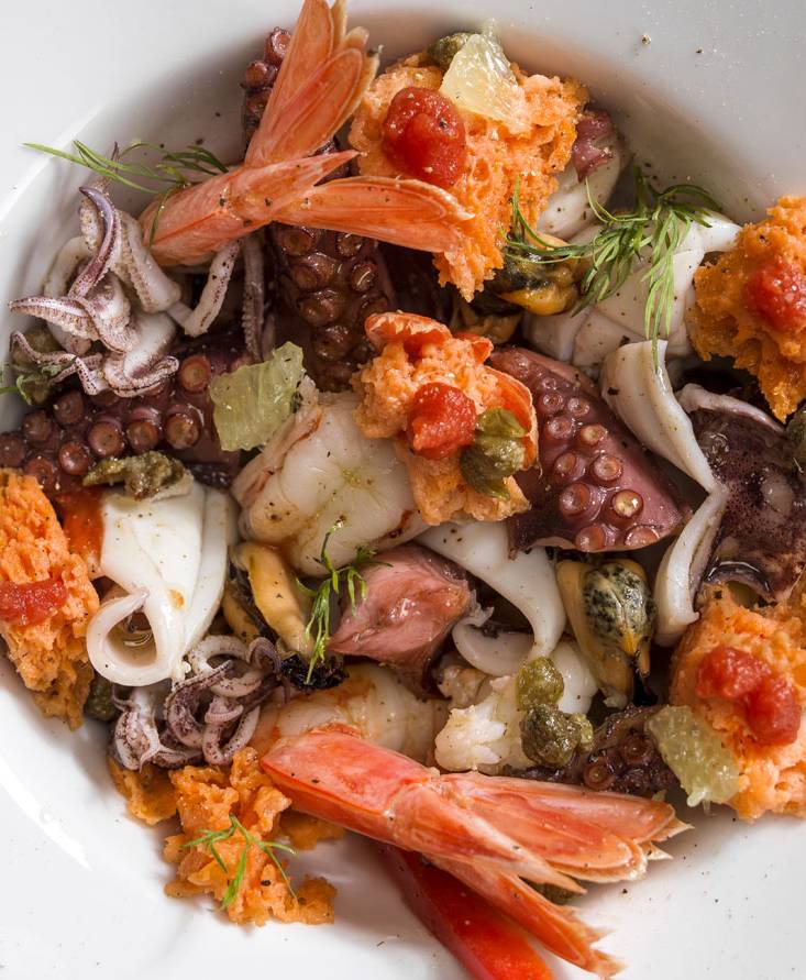 SEAFOOD SALAD WITH TOMATO “SPONGES” AND FRIED CAPERS