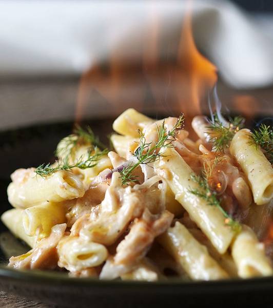 Salmon, vodka and tomato juice pennette flambé