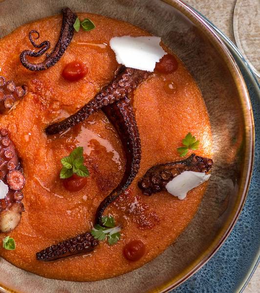 TOMATO POLENTA WITH CRISPY OCTOPUS AND RICOTTA FLAKES