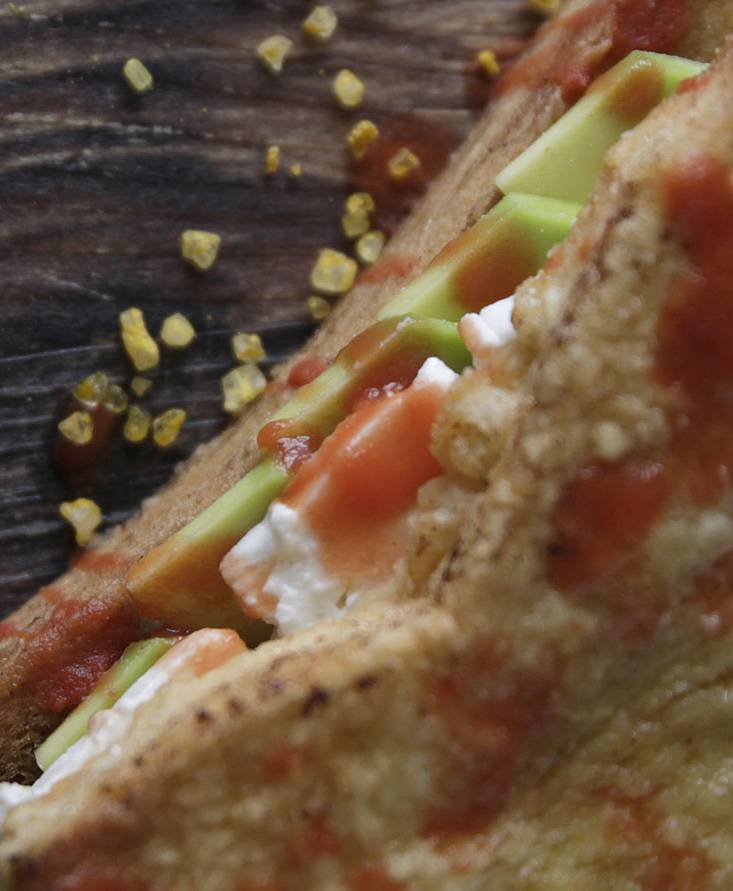 French toast with avocado, feta and tomato juice